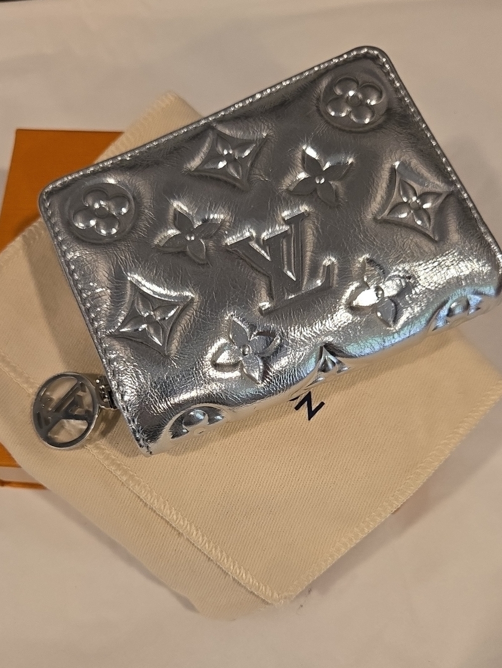 #190 - Louis Vuitton Ski Collection compact zip wallet metallic silver